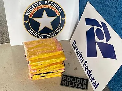 Peruano é preso com 9,4 kg de droga em fundo falso de bagagem