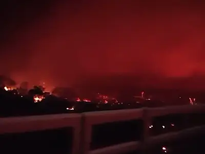 Incêndio na região de Porto Morrinho tinge o céu vermelho e parece engolir a ponte