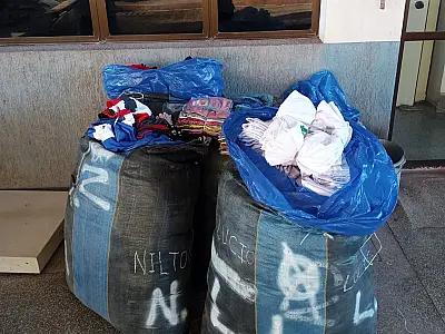 Mulher é presa transportando 356 kg de roupas falsificadas